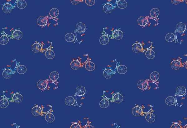 Druk na tkaninie- kolorowe rowery na niebieskim tle