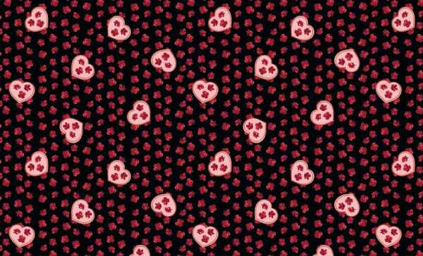 Druk na tkaninie- różowe serca i czerwone goździki na czerni