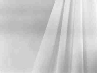 Zdjęcie przedstawiające przybliżenie na bawełnianą dzianinę single jersey- materiał do druku- w kolorze białym