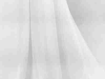 Zdjęcie przedstawiające biały materiał do druku- dzianinę drapaną PSU-1 w przybliżeniu 