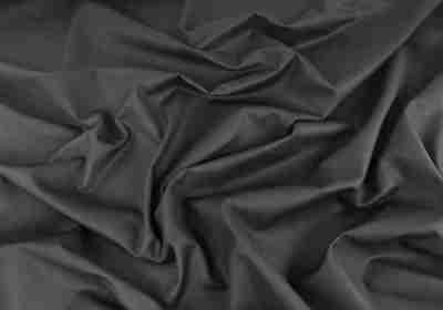 Zdjęcie przedstawiające czarną tkaninę bawełnianą, Drelich na ubrania robocze i akcesoria