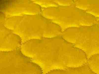 Zdjęcie przedstawiające żółtą tkaninę welur, velvet dekoracyjny (100% poliester)