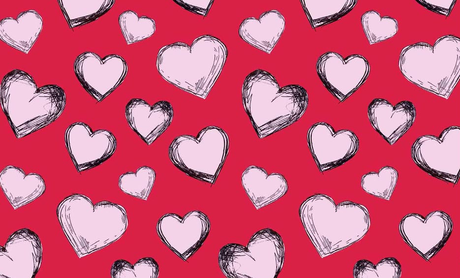 Zdjęcie prezentujące wzór w rysowane różowe serca na tle w kolorze czerwonym