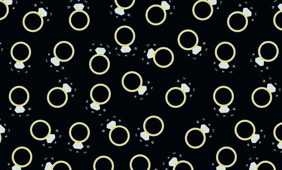 Zdjęcie przedstawiające wzór do nadruku na tkaniny i dzianiny, złote pierścionki z diamentami na tle w kolorze czarnym