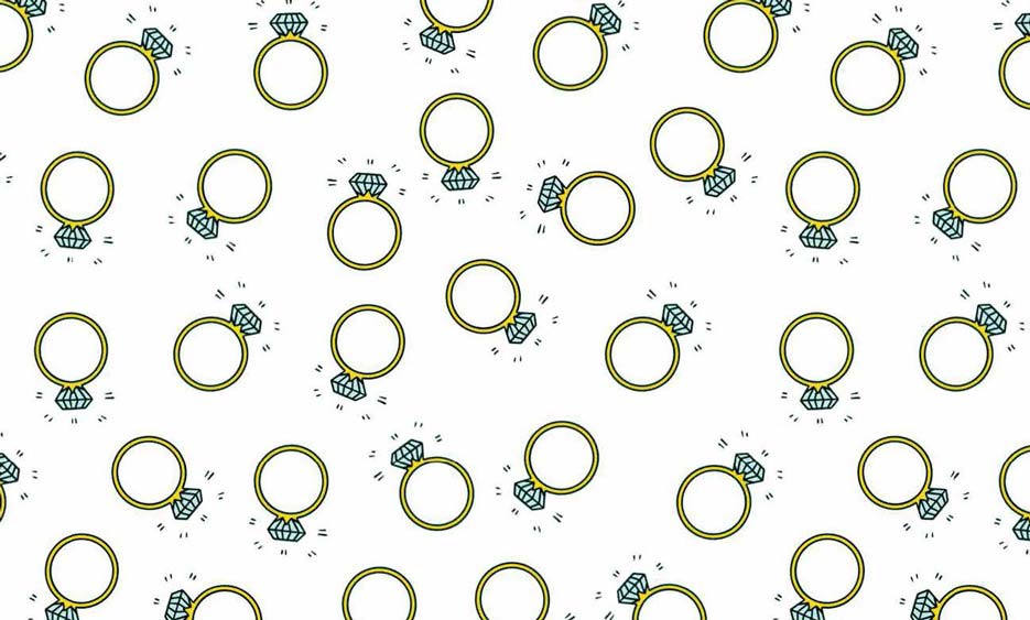 Zdjęcie przedstawiające wzór do nadruku na tkaninach i dzianinach złote pierścionki z brylantem na białym tle