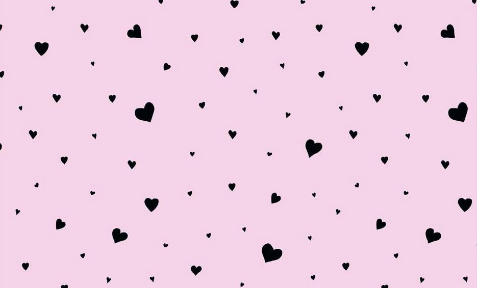 Zdjęcie prezentujące wzór do nadruku na tkaniny i dzianiny, czarne serca na tle w kolorze różowym