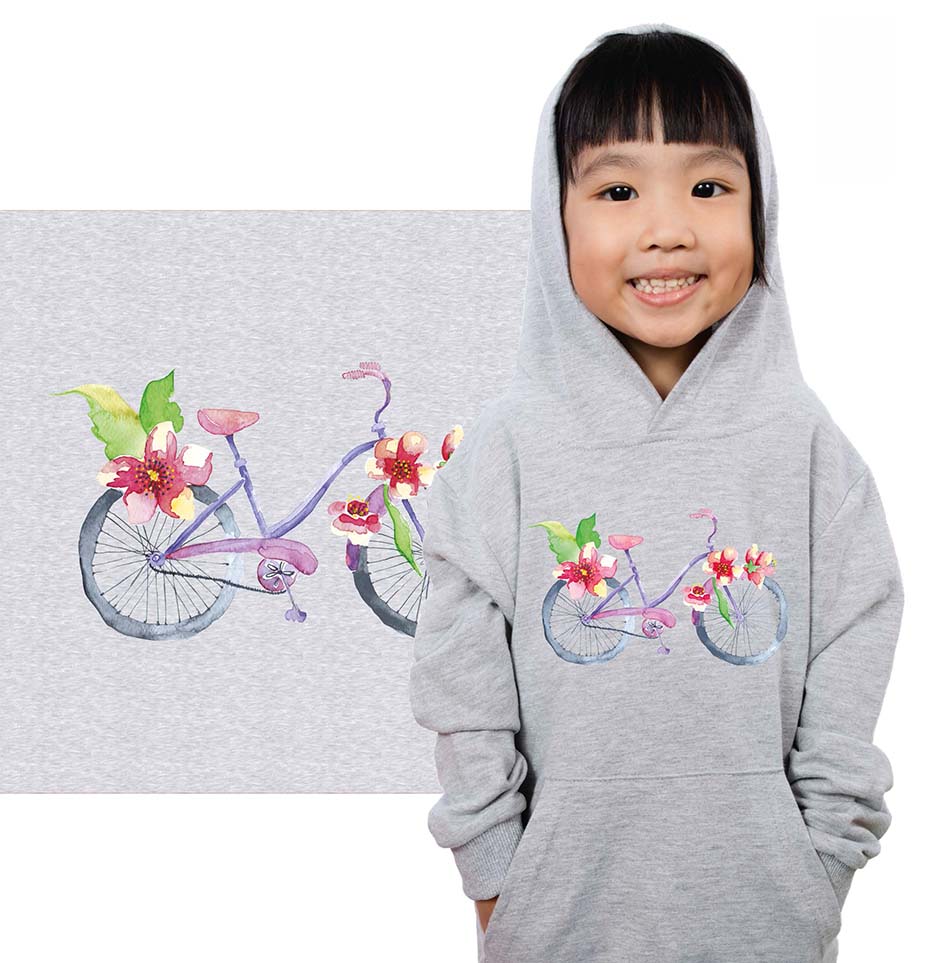 Zdjęcie prezentujące wzór do druku na tkaniny i dzianiny poliestrowe z wiosennym motywem roweru i kwiatów